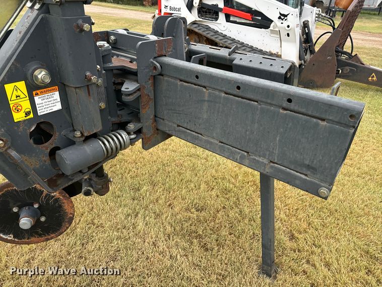 image for item DQ6853 Bobcat skid steer silt fence installer