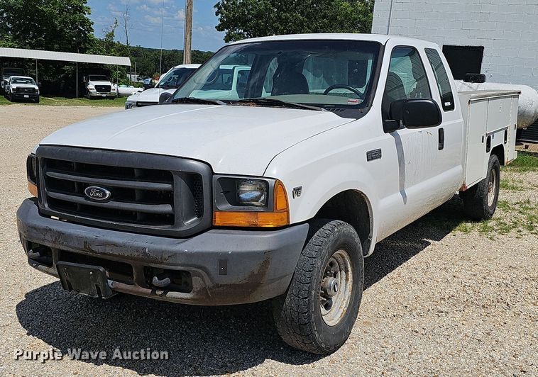 image for item EJ5755 1999 Ford F250 Super Duty SuperCab utility bed pickup truck