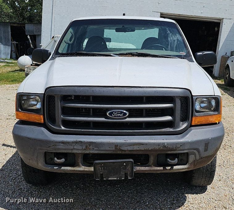 image for item EJ5755 1999 Ford F250 Super Duty SuperCab utility bed pickup truck