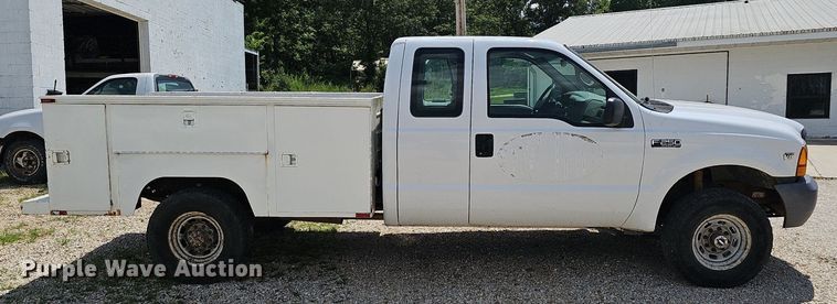 image for item EJ5755 1999 Ford F250 Super Duty SuperCab utility bed pickup truck