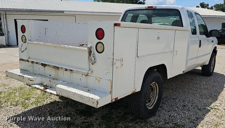 image for item EJ5755 1999 Ford F250 Super Duty SuperCab utility bed pickup truck