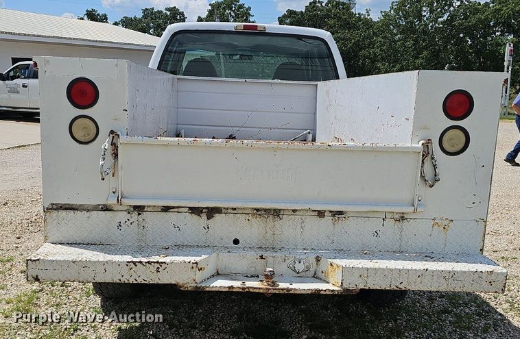 image for item EJ5755 1999 Ford F250 Super Duty SuperCab utility bed pickup truck