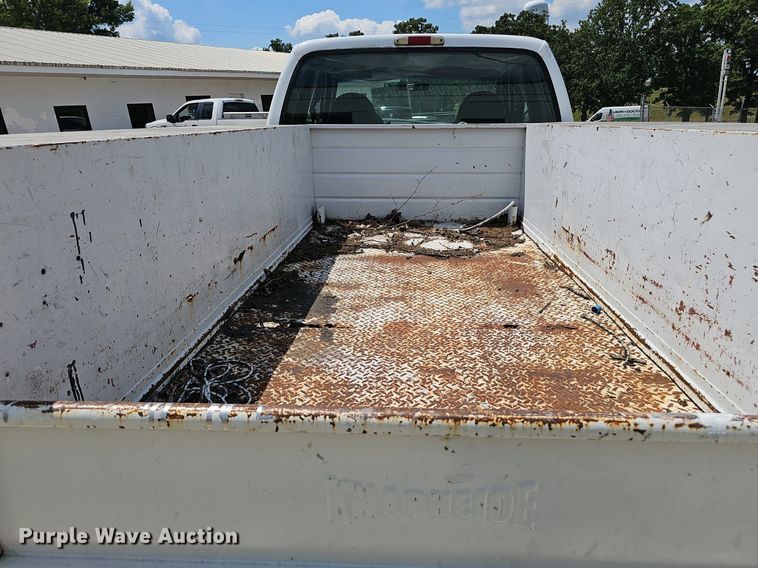 image for item EJ5755 1999 Ford F250 Super Duty SuperCab utility bed pickup truck