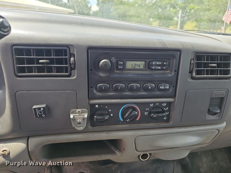 image for item EJ5755 1999 Ford F250 Super Duty SuperCab utility bed pickup truck