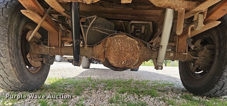 image for item EJ5755 1999 Ford F250 Super Duty SuperCab utility bed pickup truck