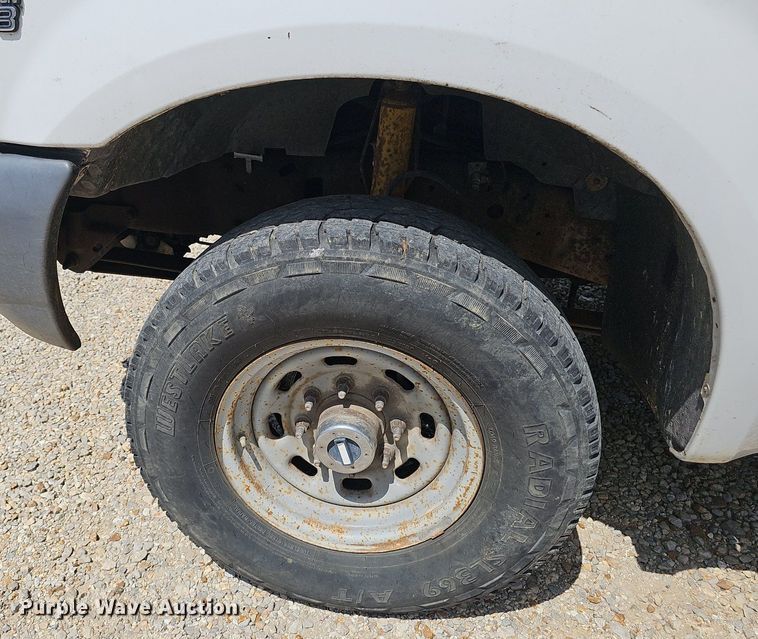 image for item EJ5755 1999 Ford F250 Super Duty SuperCab utility bed pickup truck