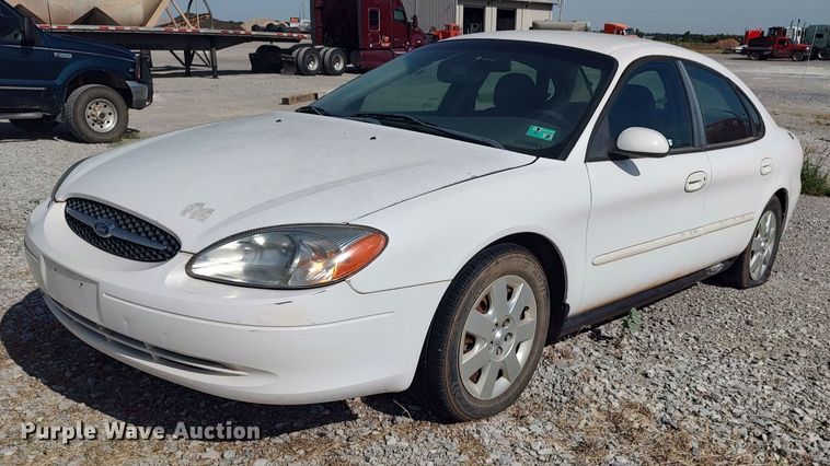 2000 Ford Taurus VIN: 1FAFP53U0YG111075 Lot: 999147934