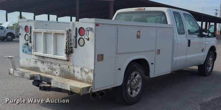 image for item NG9912 2014 Ford  F250 Super Duty  SuperCab utility bed pickup truck