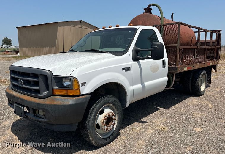 image for item DO7021 1999 Ford F450 Super Duty flatbed truck