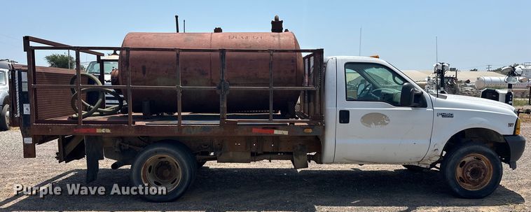 image for item DO7021 1999 Ford F450 Super Duty flatbed truck