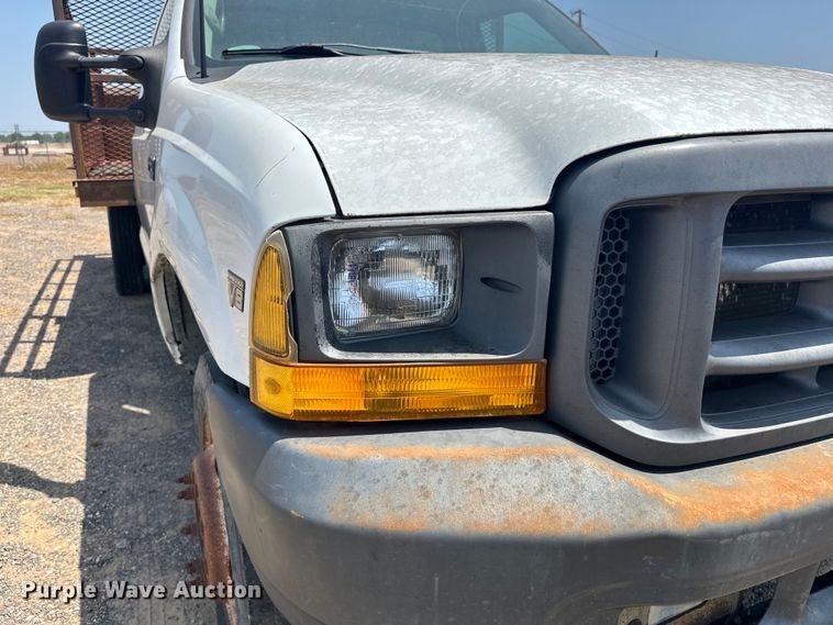 image for item DO7021 1999 Ford F450 Super Duty flatbed truck