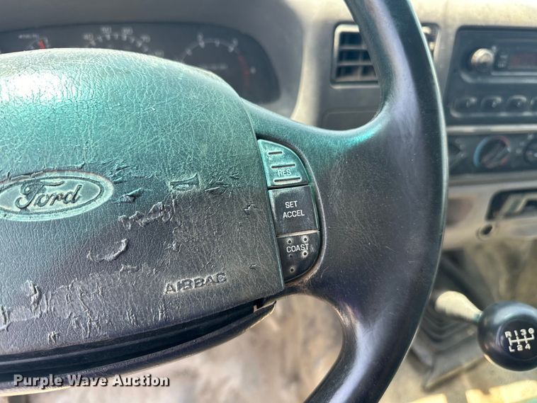 image for item DO7021 1999 Ford F450 Super Duty flatbed truck