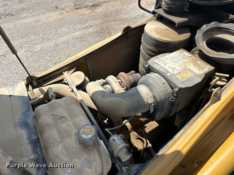 image for item DO7097 2007 Caterpillar  414E IL loader