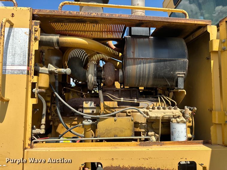 image for item DO7100 1997 Caterpillar  12H motor grader