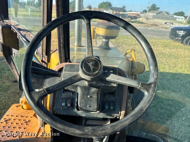 image for item DQ6836 John Deere 310D backhoe