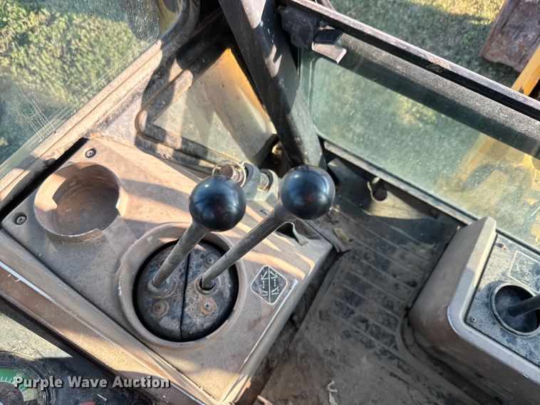 image for item DQ6836 John Deere 310D backhoe