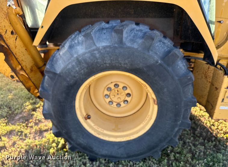 image for item DQ6836 John Deere 310D backhoe