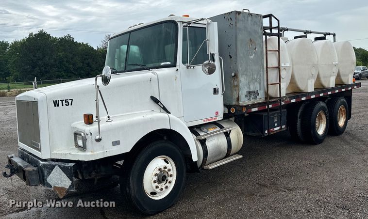 image for item MU9939 1994 White GMC water truck