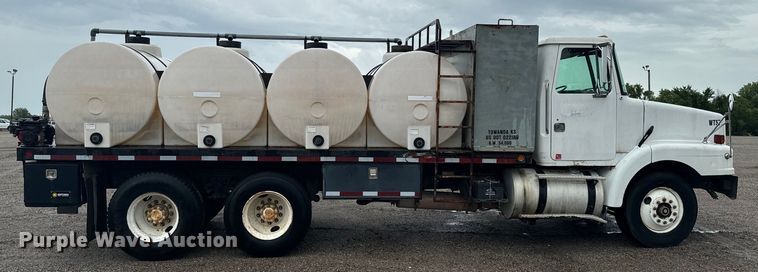 image for item MU9939 1994 White GMC water truck