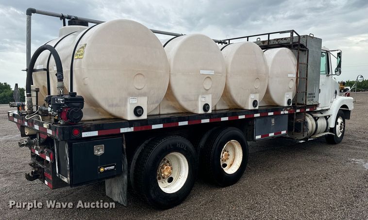 image for item MU9939 1994 White GMC water truck