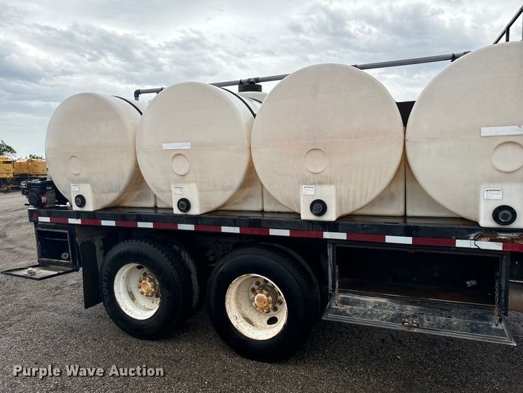 image for item MU9939 1994 White GMC water truck