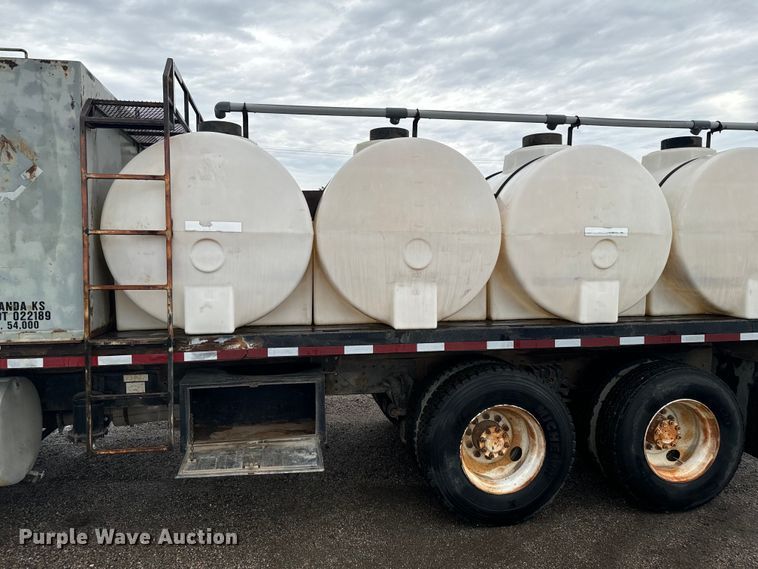 image for item MU9939 1994 White GMC water truck