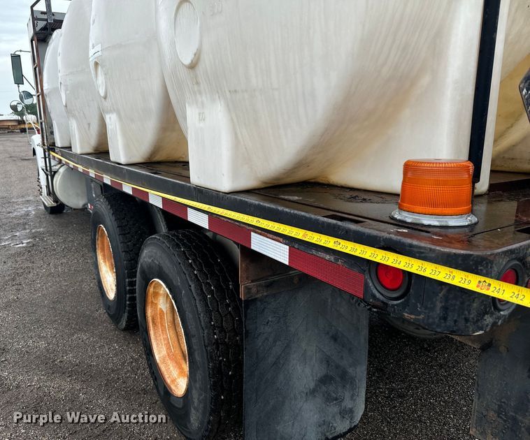 image for item MU9939 1994 White GMC water truck