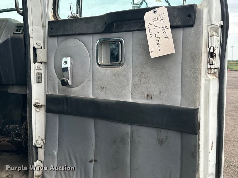 image for item MU9939 1994 White GMC water truck