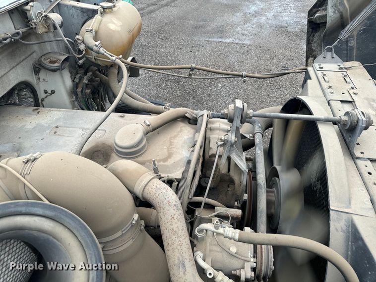 image for item MU9939 1994 White GMC water truck