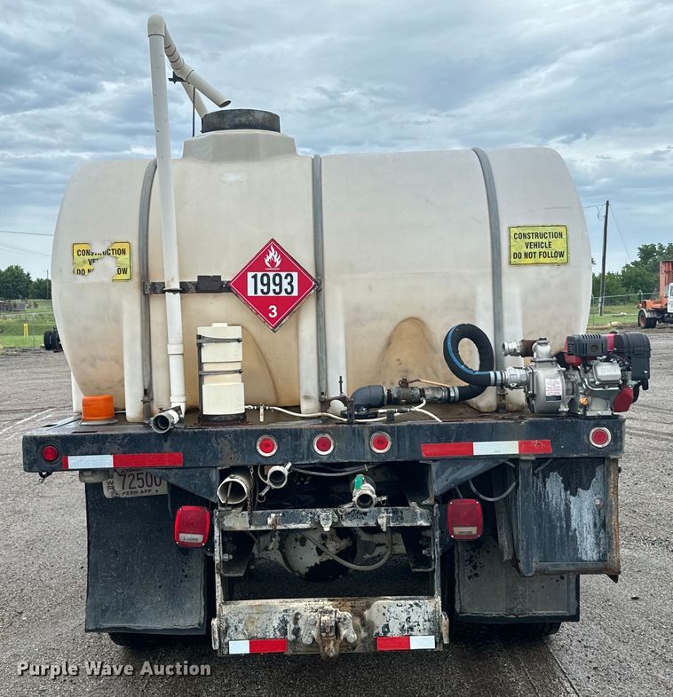 image for item MU9941 1992 White GMC WCA water truck