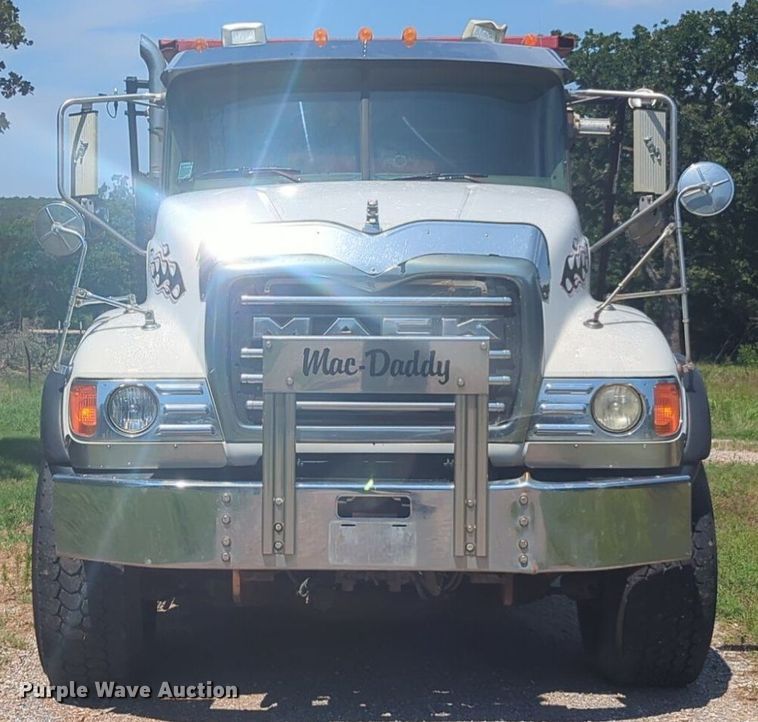 image for item NG9976 2005 Mack  CV713 Granite  roll-off container truck