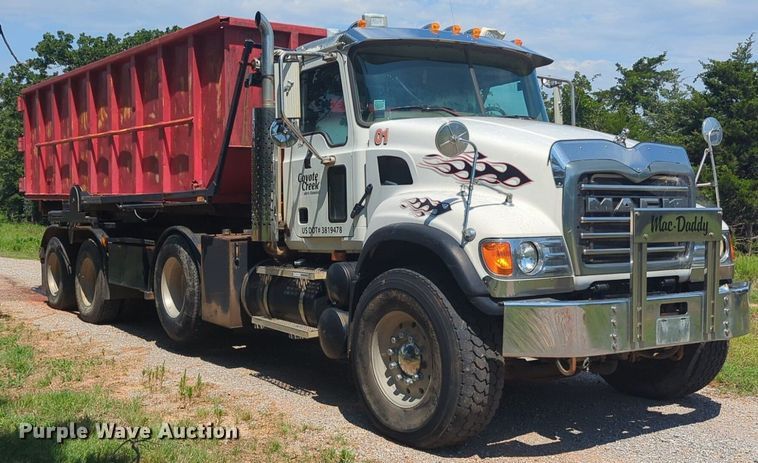 image for item NG9976 2005 Mack  CV713 Granite  roll-off container truck