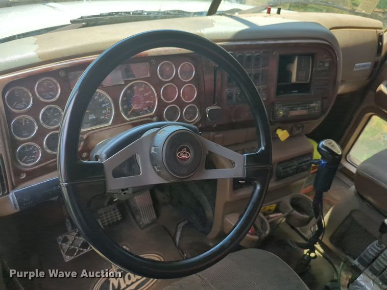 image for item NG9976 2005 Mack  CV713 Granite  roll-off container truck