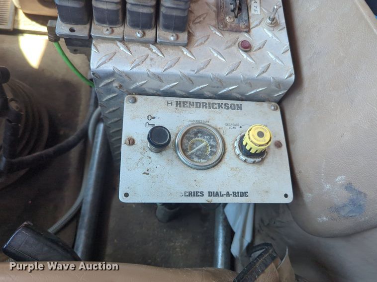 image for item NG9976 2005 Mack  CV713 Granite  roll-off container truck