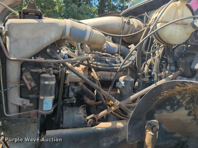 image for item NG9976 2005 Mack  CV713 Granite  roll-off container truck