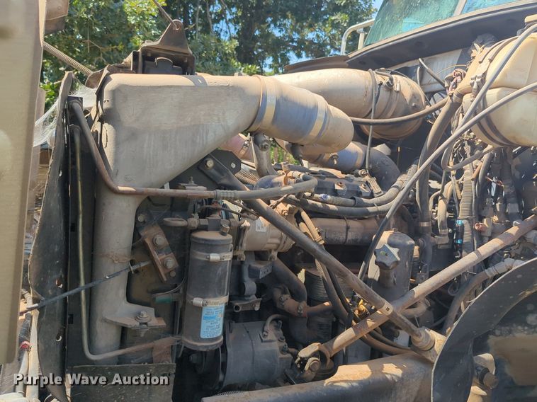 image for item NG9976 2005 Mack  CV713 Granite  roll-off container truck