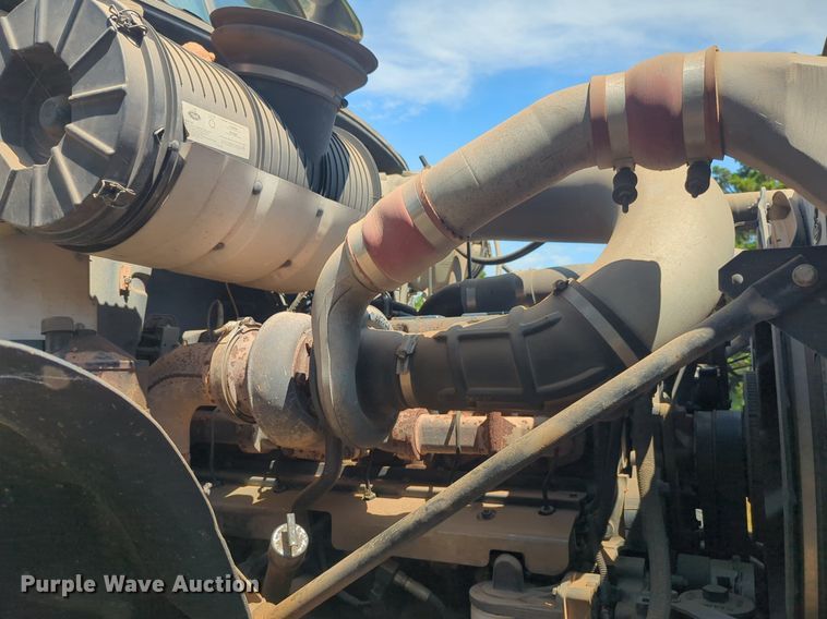 image for item NG9976 2005 Mack  CV713 Granite  roll-off container truck