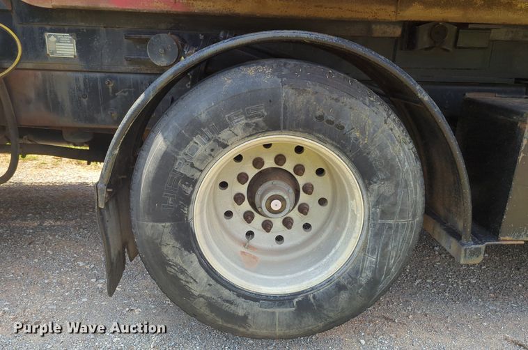 image for item NG9976 2005 Mack  CV713 Granite  roll-off container truck