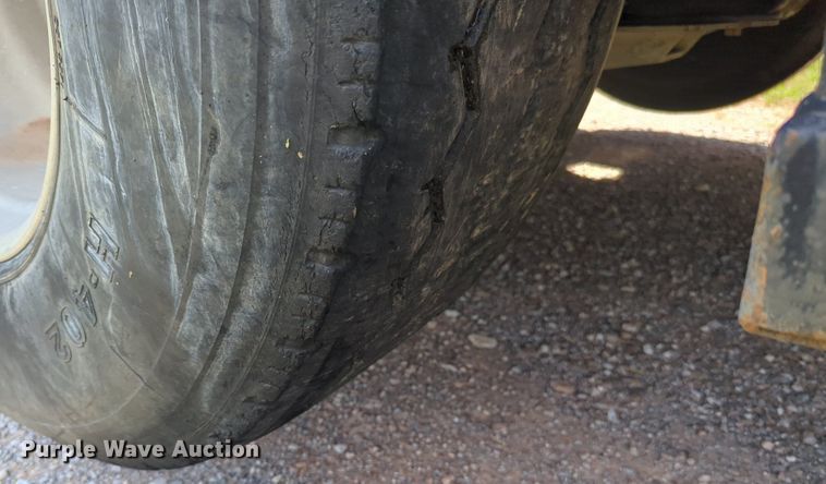 image for item NG9976 2005 Mack  CV713 Granite  roll-off container truck