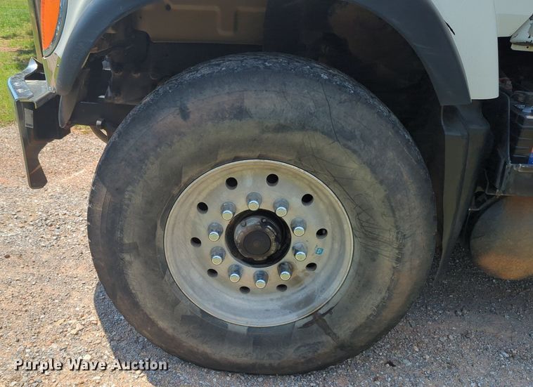 image for item NG9976 2005 Mack  CV713 Granite  roll-off container truck