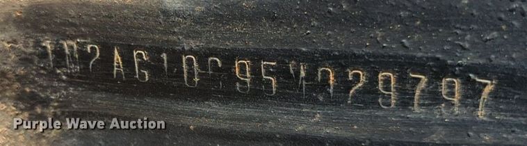 image for item NG9976 2005 Mack  CV713 Granite  roll-off container truck