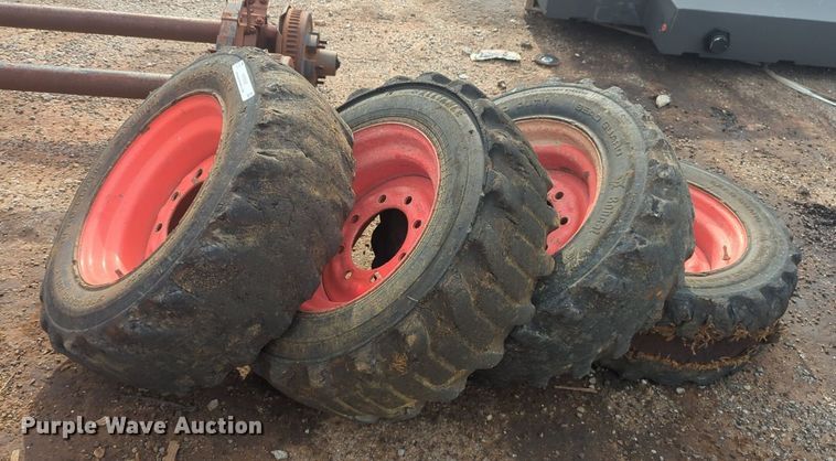 image for item NW9546 (4) 10x16.5 NHS skid steer tires and wheels