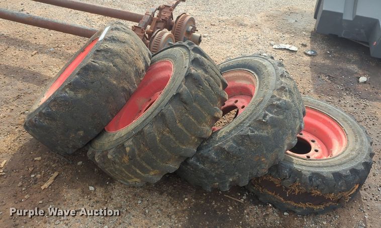image for item NW9546 (4) 10x16.5 NHS skid steer tires and wheels