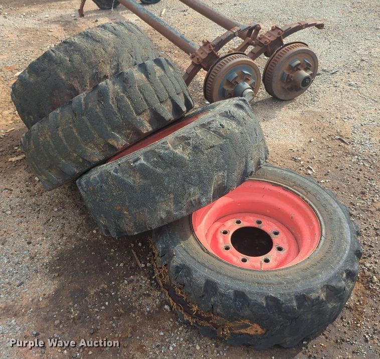 image for item NW9546 (4) 10x16.5 NHS skid steer tires and wheels