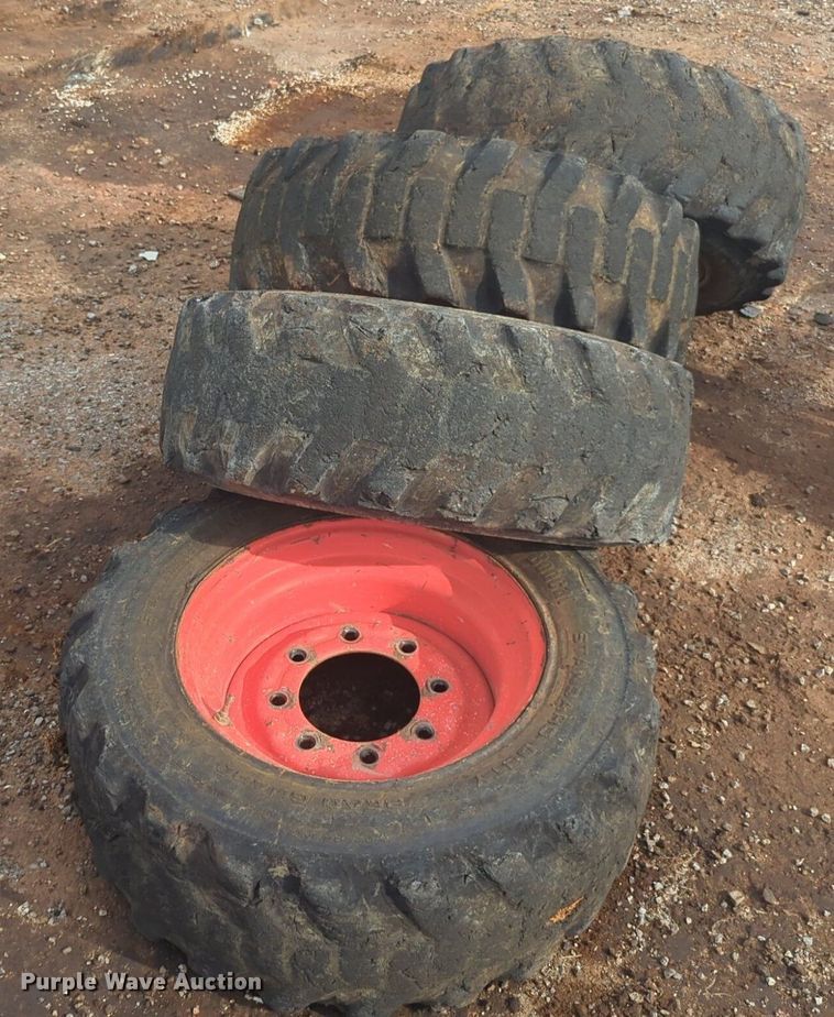 image for item NW9546 (4) 10x16.5 NHS skid steer tires and wheels