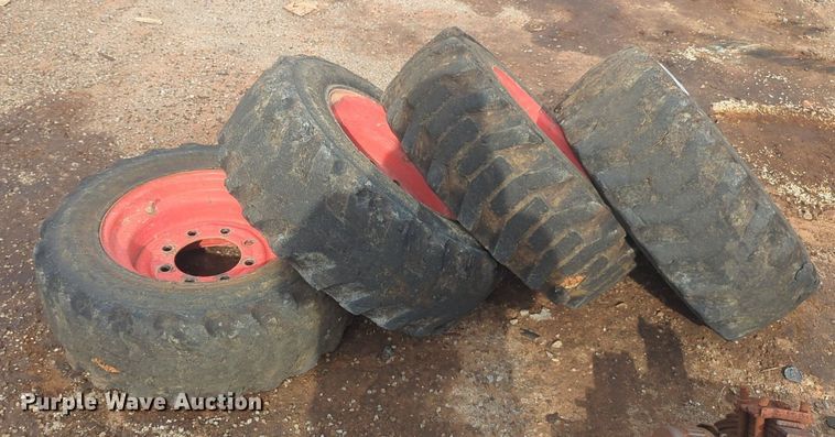 image for item NW9546 (4) 10x16.5 NHS skid steer tires and wheels