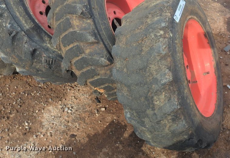image for item NW9546 (4) 10x16.5 NHS skid steer tires and wheels