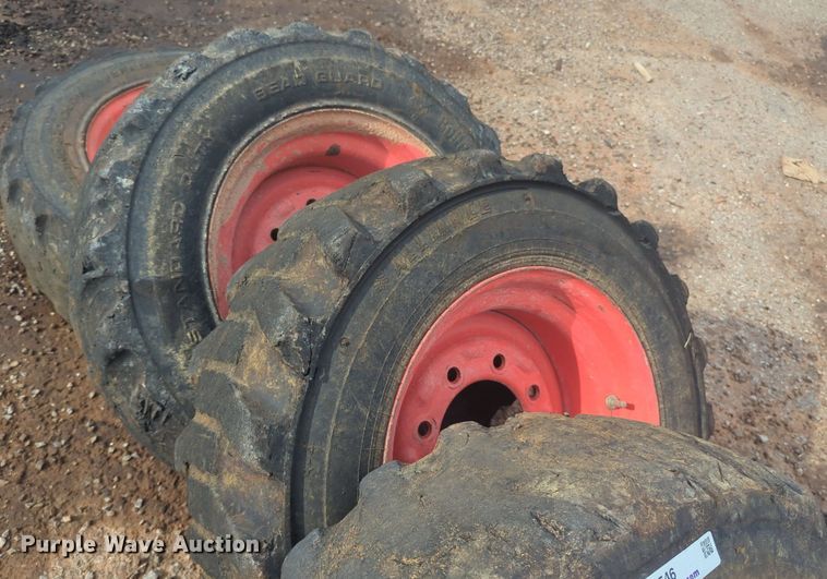 image for item NW9546 (4) 10x16.5 NHS skid steer tires and wheels