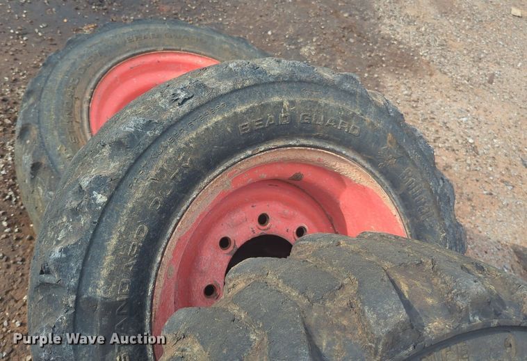 image for item NW9546 (4) 10x16.5 NHS skid steer tires and wheels