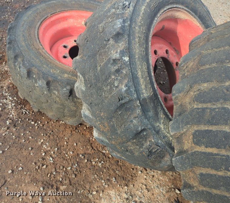 image for item NW9546 (4) 10x16.5 NHS skid steer tires and wheels